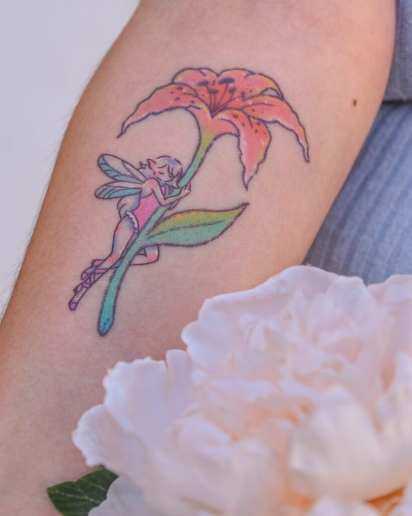 beautiful fairy color tattoo in cancun